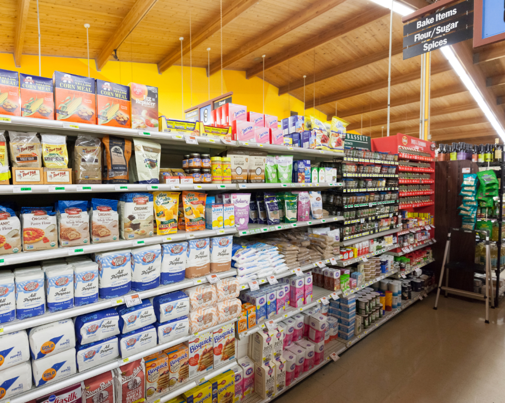 Items organised with a theme on gondola shelf